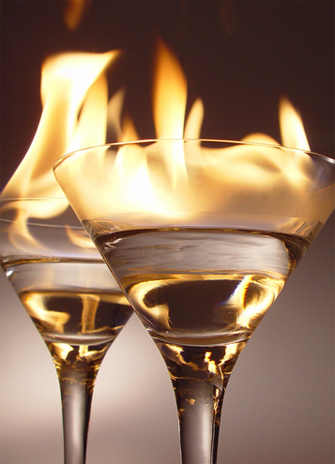 a glass containing flaming alcohol