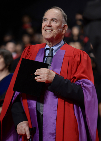 John Abele arrives on the York University convocation stage to receive an honorary degree
