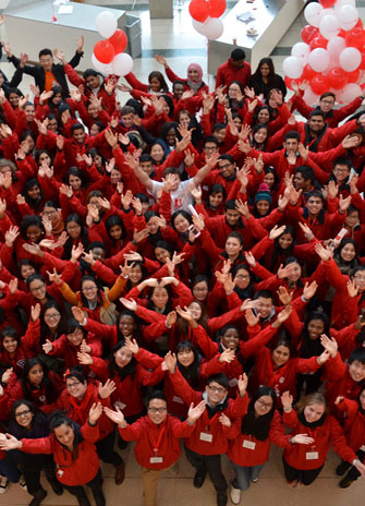 A crowd of students celebrating red and white day