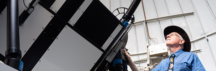 Prof Paul Delaney with the new telescope at York University
