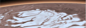 Mars South Polar Layered Deposits on top of Martian Smectites: The multi-kilometer thick south polar ice cap has a base that is composed, at least partially, of a common type of clays. These clays are found over nearly half of the planet's surface and now at the edges of the ice cap. Radar measurements of the clays from a lab led by Smith show that they can explain the bright reflections observed by MARSIS, a simpler explanation than bodies of liquid water. Credits: ESA/DRL/FU Berlin (top), NASA (bottom).