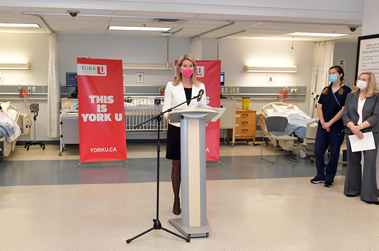 Ontario's Minister of Colleges and Universities Jill Dunlop announces the establishment of York University's new stand-alone four-year Bachelor of Science in Nursing degree. Looking on is nursing student Diana Dzhumabaeva with President and Vice-Chancellor Rhonda L. Lenton