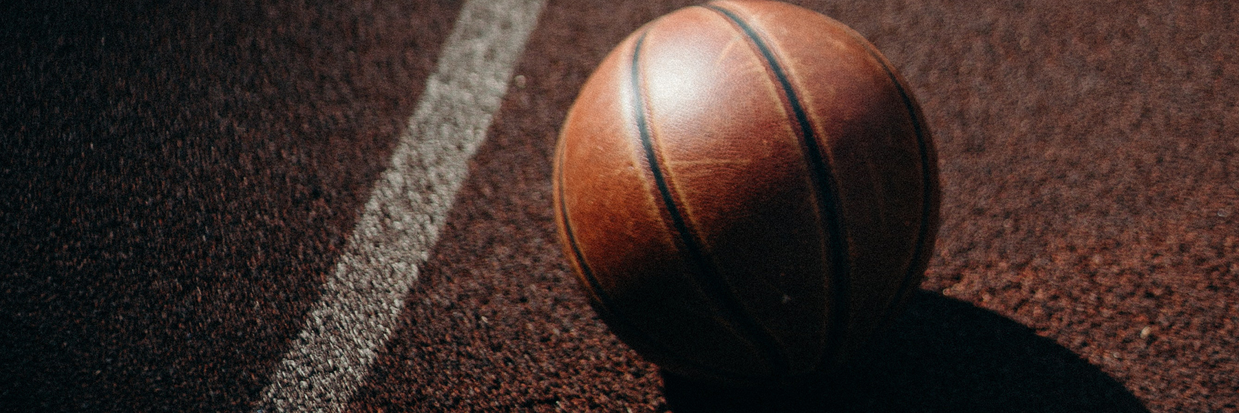 a basketball sits on a court