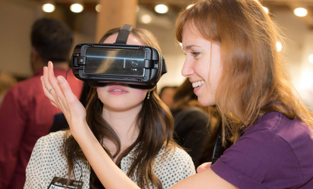 York researcher Lora Appel demonstrates a VR headset during a recent TO Health gathering