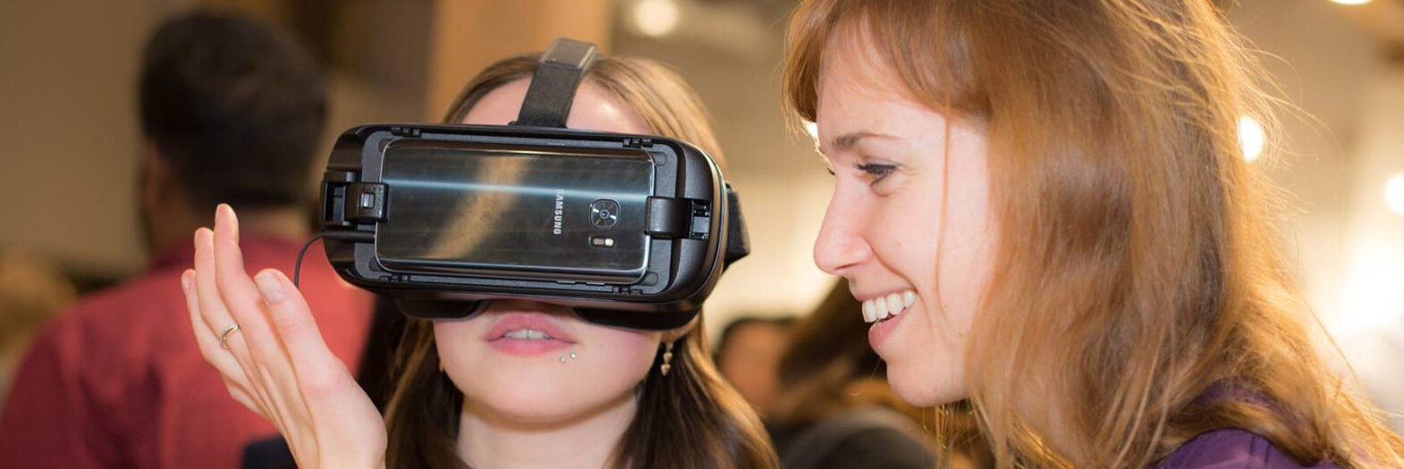 York researcher Lora Appel demonstrates a VR headset during a recent TO Health gathering