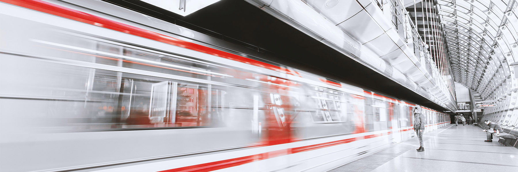 blurred image of subway passing through station terminal