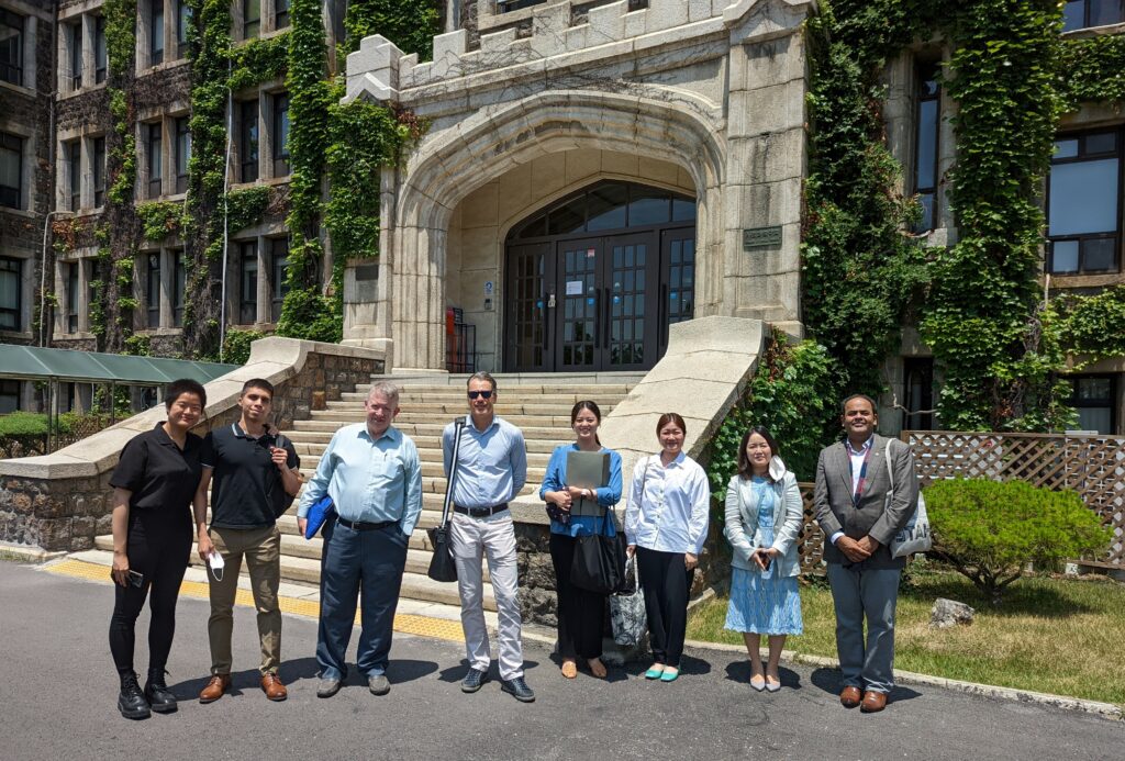 Conference participants outside of the venue. From left to right: Two Yonsei University students; La Trobe University Adjunct Professor Nicholas Morris; York University Professor Ian Roberge; two Yonsei University students; Yonsei University Professor Nara Park; and Jawad Hussain Qureshi, Privy Council Office, Government of Canada.