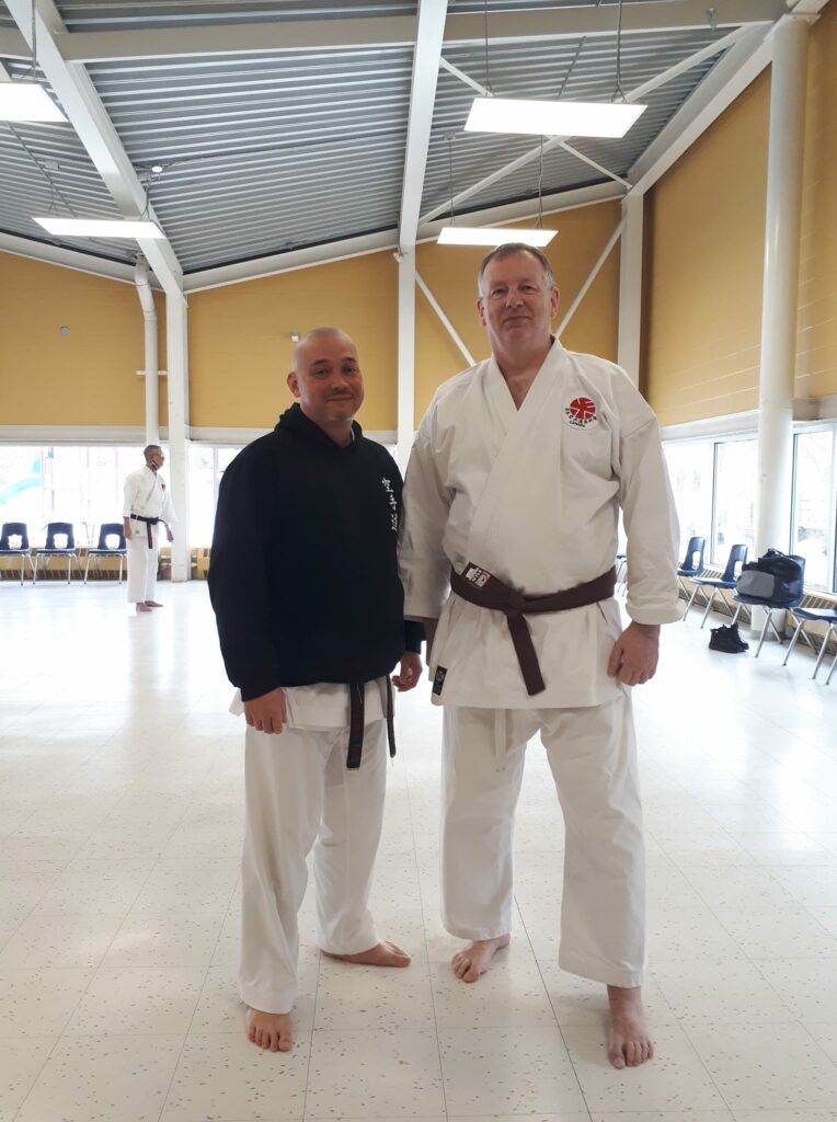 Sensei Daniel Tsumara with Phillips, who was promoted to black belt (Shodan) earlier this year