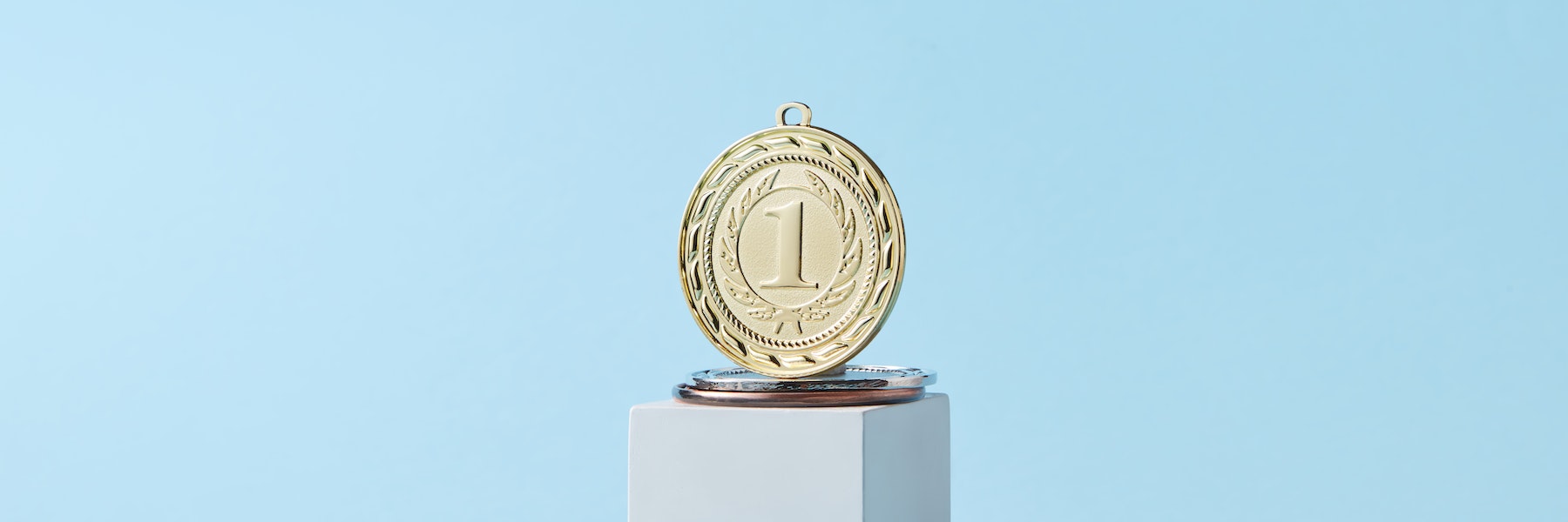 Award medallion that has the number 1 on it
