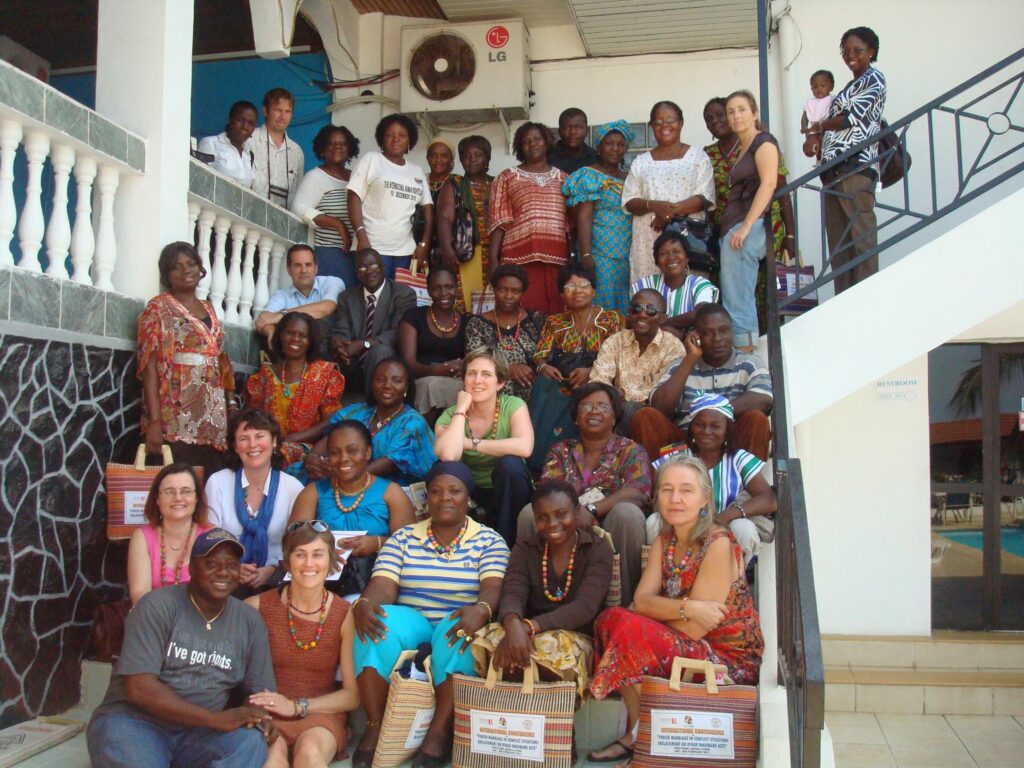 Professor Annie Bunting (front row, second from the left) and Grace Acan (front row, second from the right) in Sierra Leone.

