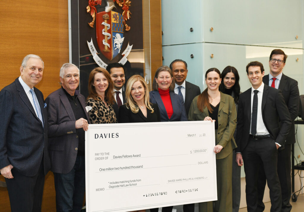 Osgoode Law School alumni representing Davies Ward Phillips & Vineberg LLP present $1.2 million cheque for the Davies Fellows Award