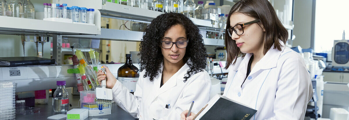Two women in a research lab