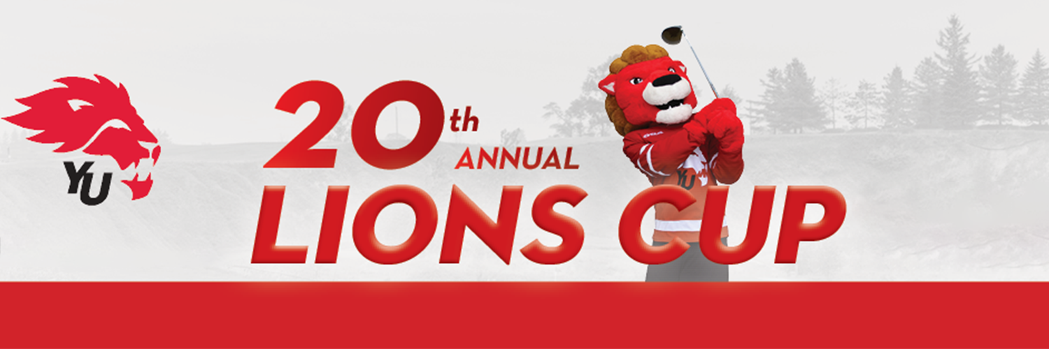 Yeo the Lion with a glub club on the Lions Cup 20th anniversary logo and banner