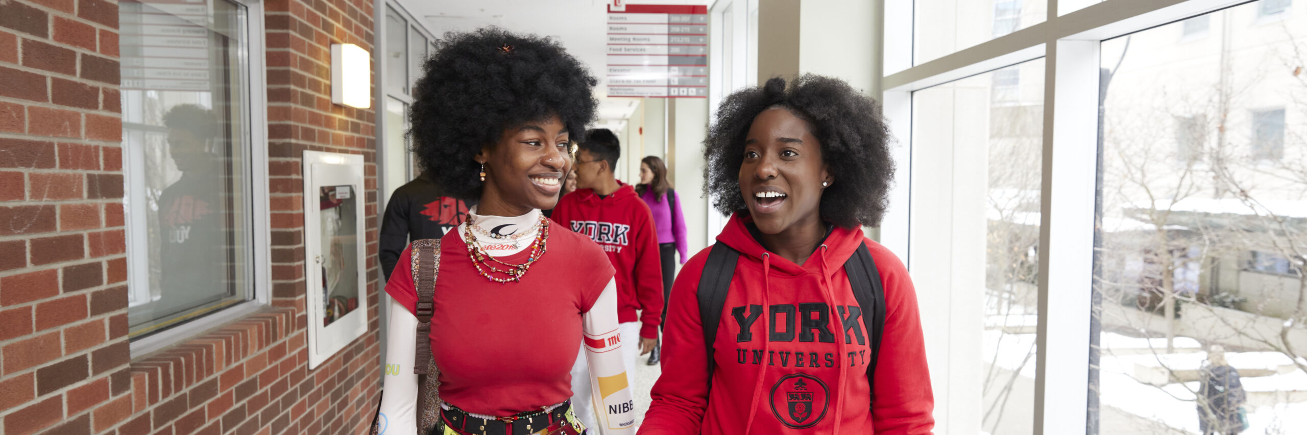 Two Black York University students walking on the Keele Campus