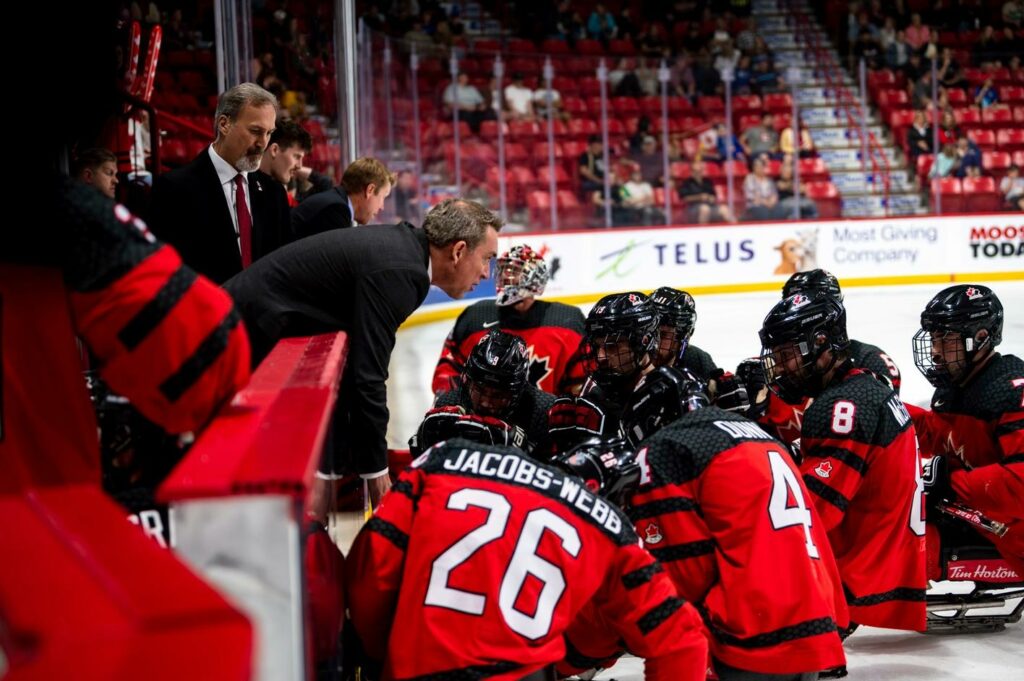 Russ Herrington coaching the Canadian national para hockey team