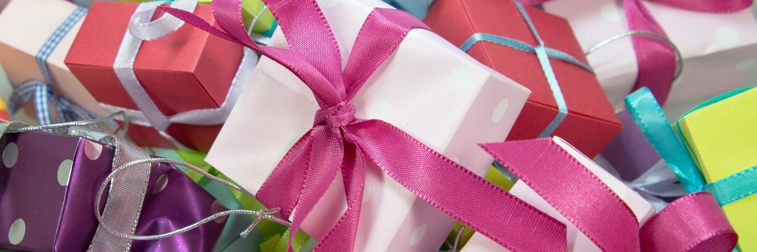 assortment of wrapped gifts banner