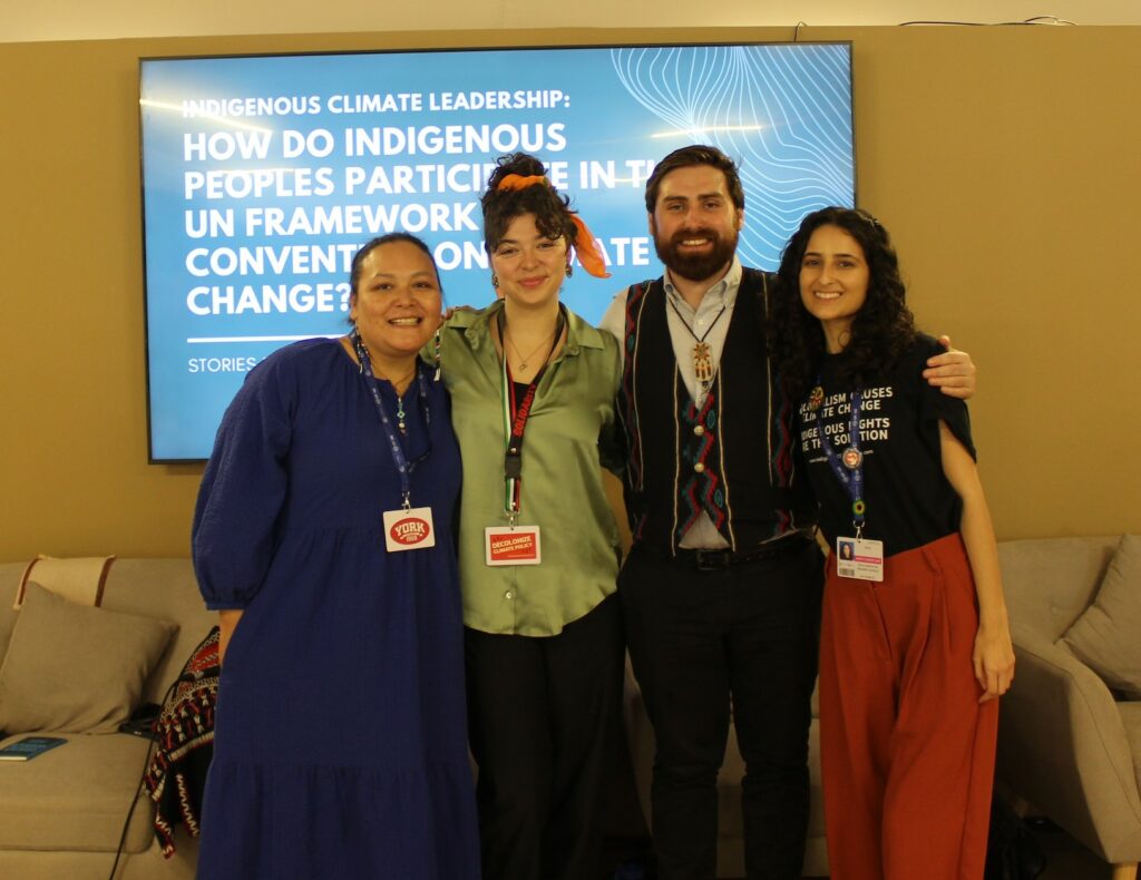 From left to right: Angele Alook, Lydia Johnson, Graeme Reed and Ana Carolina De Almeida Cardoso at the COP28 Indigenous Peoples Pavillion