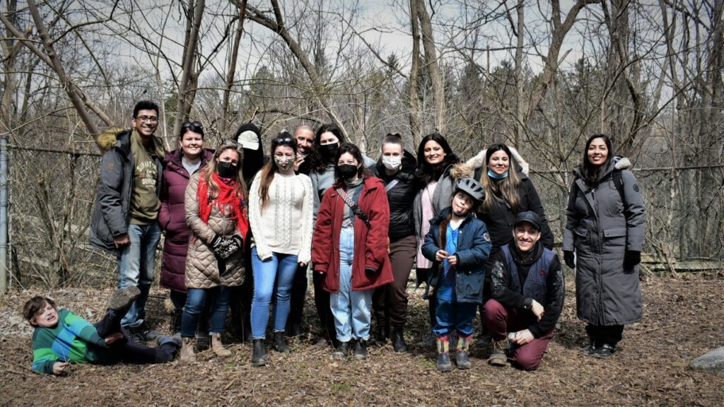 Master’s student Erin Flanagan and her classmates at Black Creek Community Farm, visiting with the members of the SweetGrass Roots Collective. 