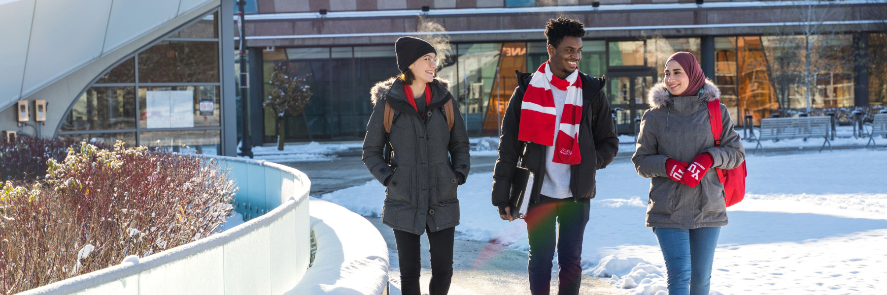 Students walking near subway on Keele Campus in winter