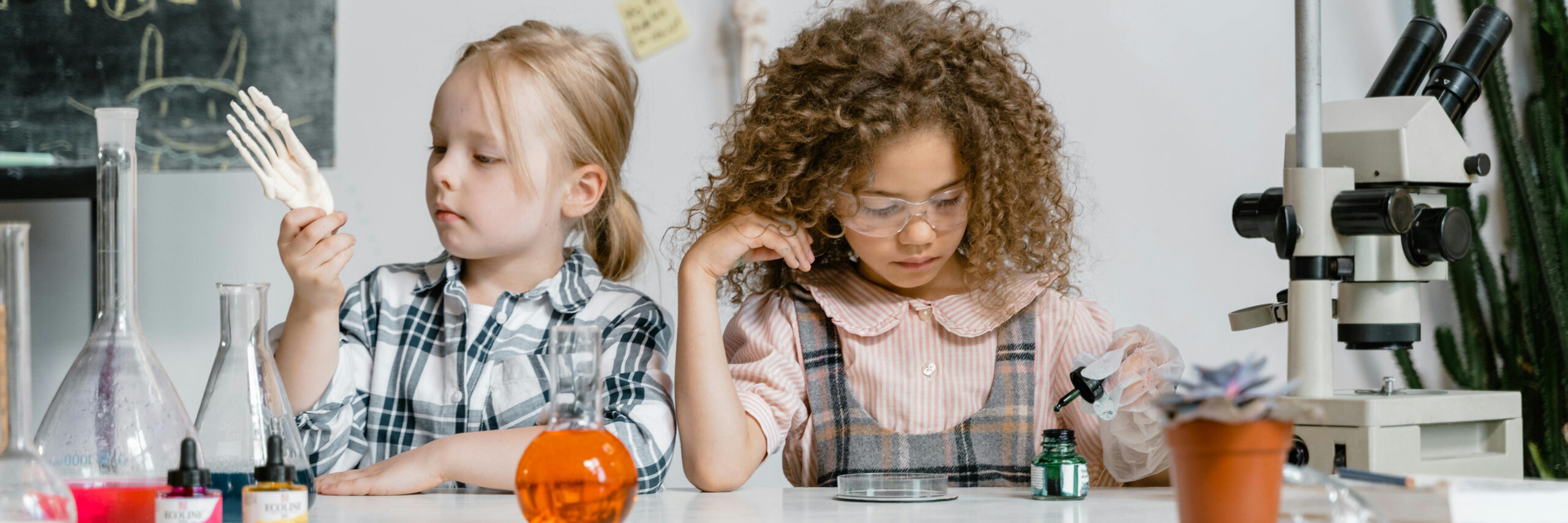 young girls doing science